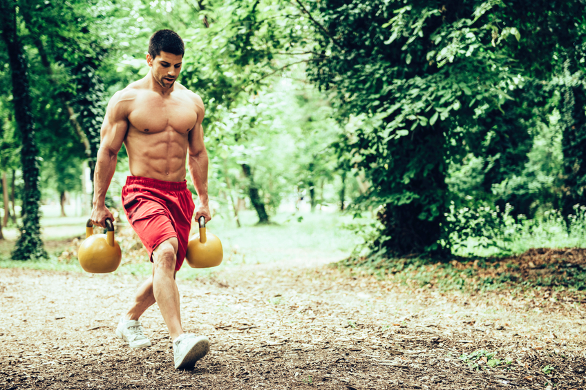 This dude is channeling his inner Thor by taking his workout to the woods 