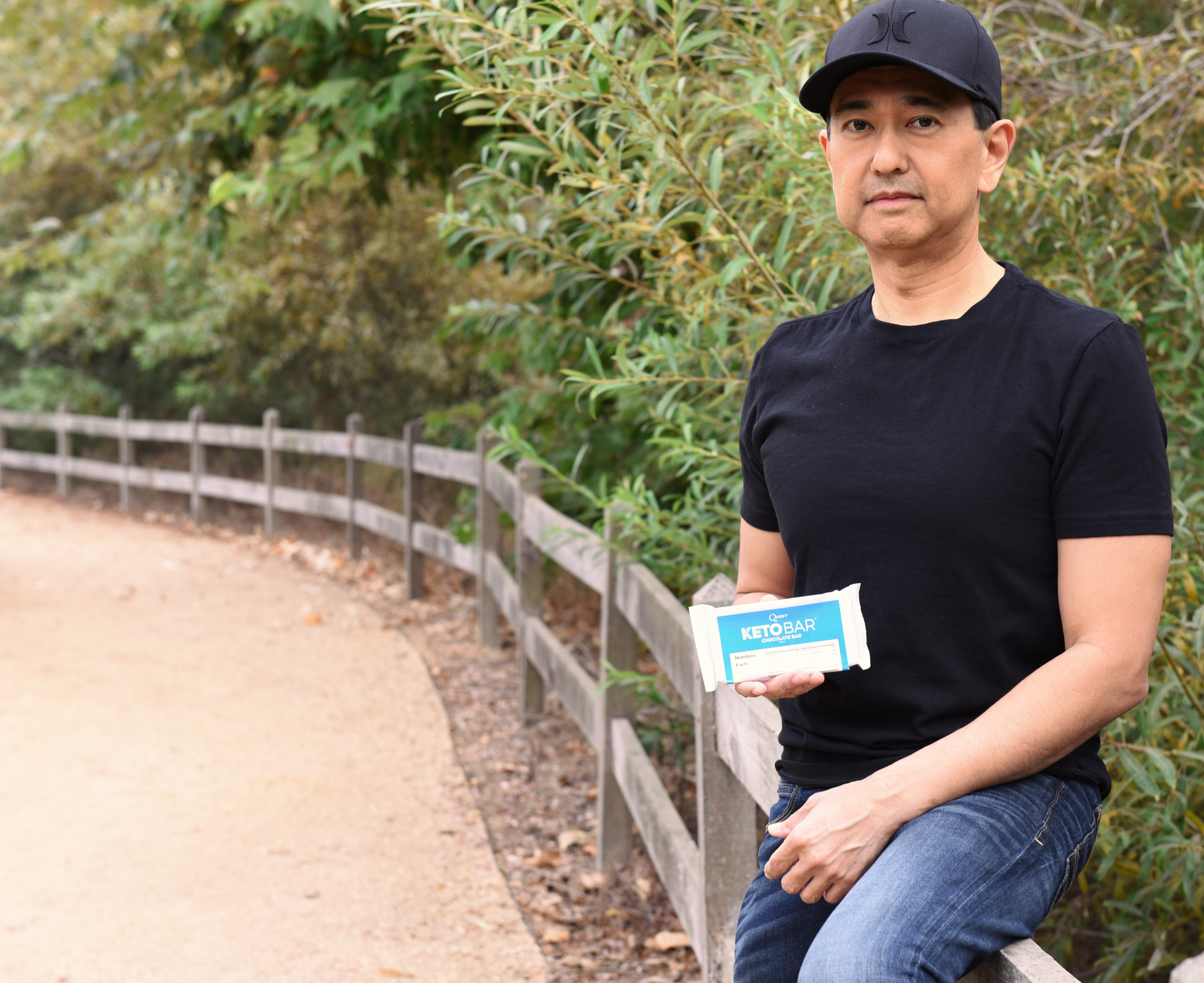 Here's Lance doing his best "blue steel" look holding the Quest Keto Chocolate Bar