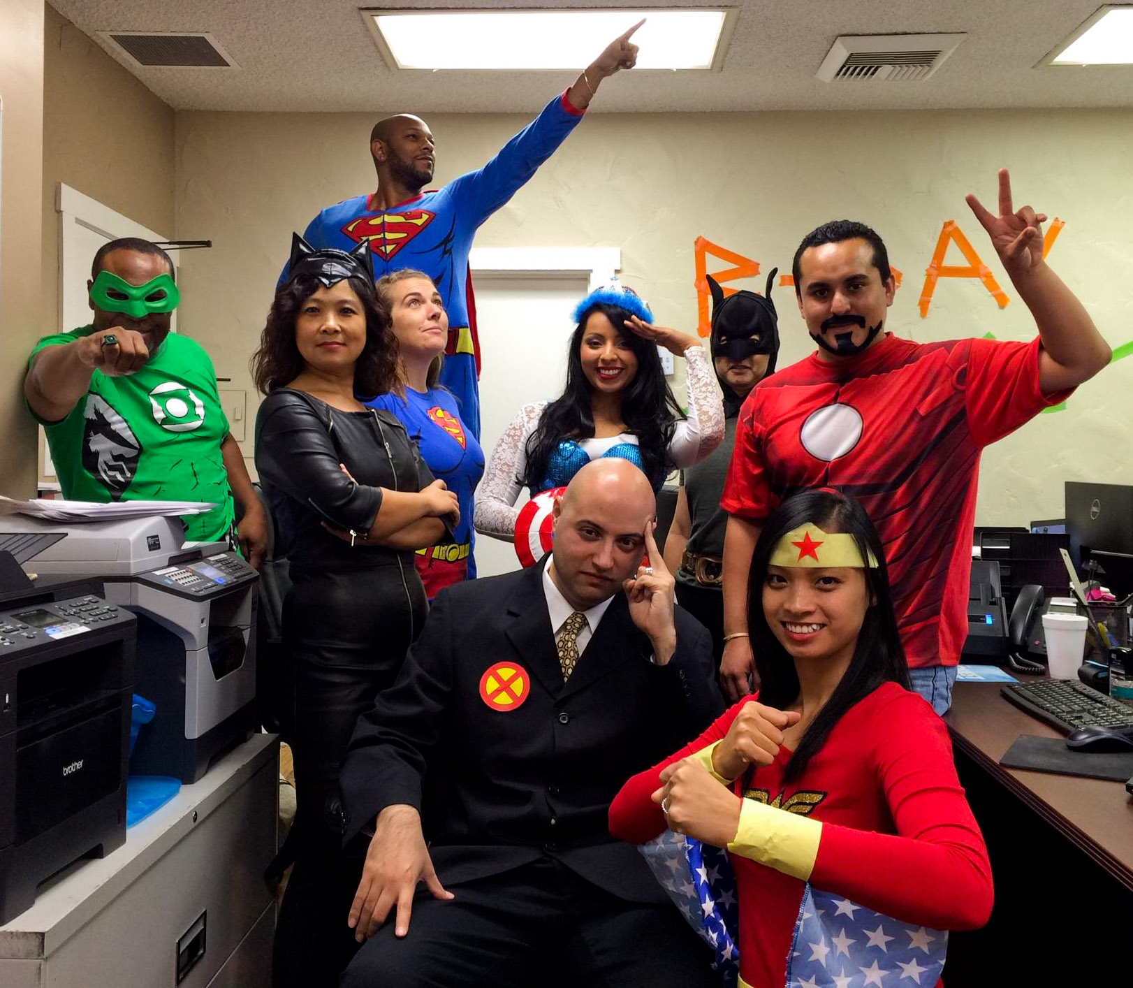 Lance (Batman) and his team before an important board meeting. (really it's for Quest's Halloween Office Costume Contest)